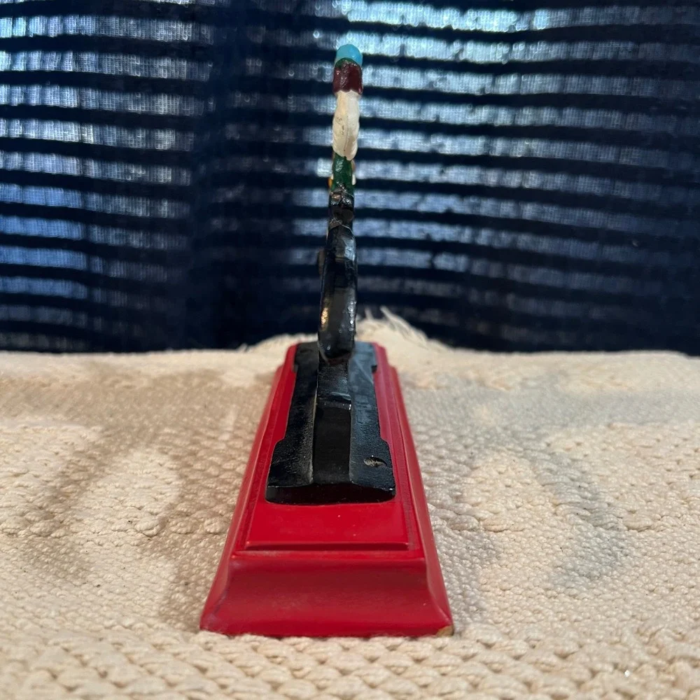 Vintage Cast Iron Nutcracker on‎ Red Wood Base Hand Painted Decor